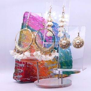 Gold tone and white earrings set